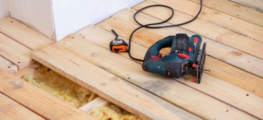 A newly built wooden deck with a power tool on top.