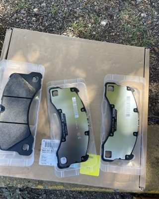 Brake pads designed specifically for Volkswagen Jetta, showcasing their shape and material for optimal vehicle performance.